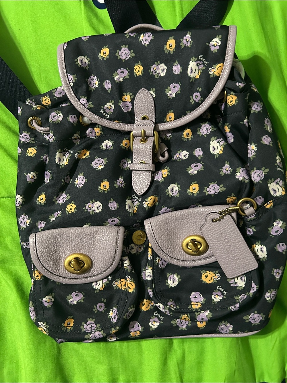 Coach Black Floral Backpack with Lavender Trim and Gold Hardware